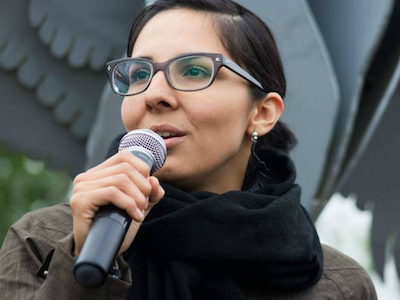 Eriel Tchekwie Deranger is a Dënesųłiné woman (ts'ékui), member of the Athabasca Chipewyan First Nation and mother of two, and the executive director of Indigenous Climate Action. She is represented for speaking engagements by Evil Twin Booking Agency